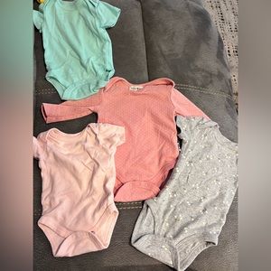 Baby girl onesies size 0-3 months.